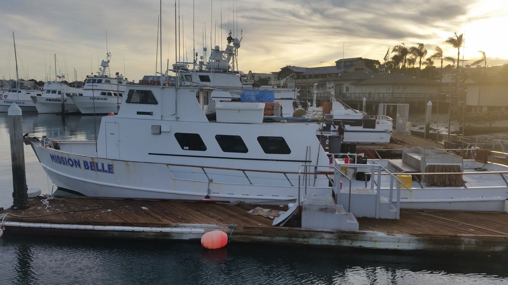 Mission Belle and neighboring sportfishers on the Point Loma slips